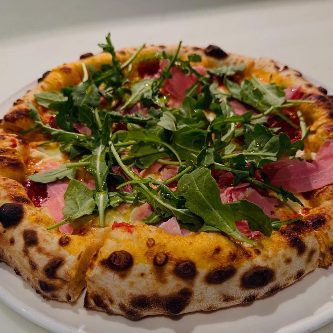 Prosciutto and arugula.